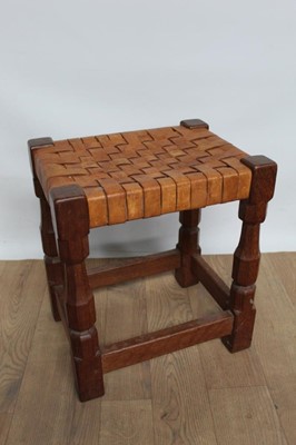 Lot 1323 - Pair of oak and woven leather stools, by David Langstaff in the Mouseman tradition