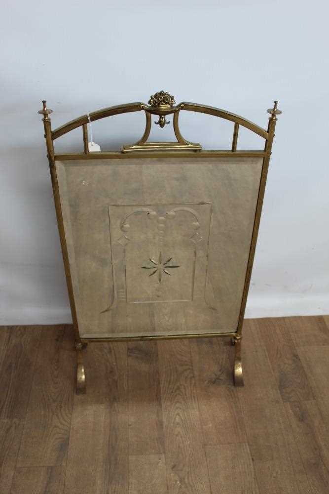 Lot 1053 - Brass and mirrored fire guard