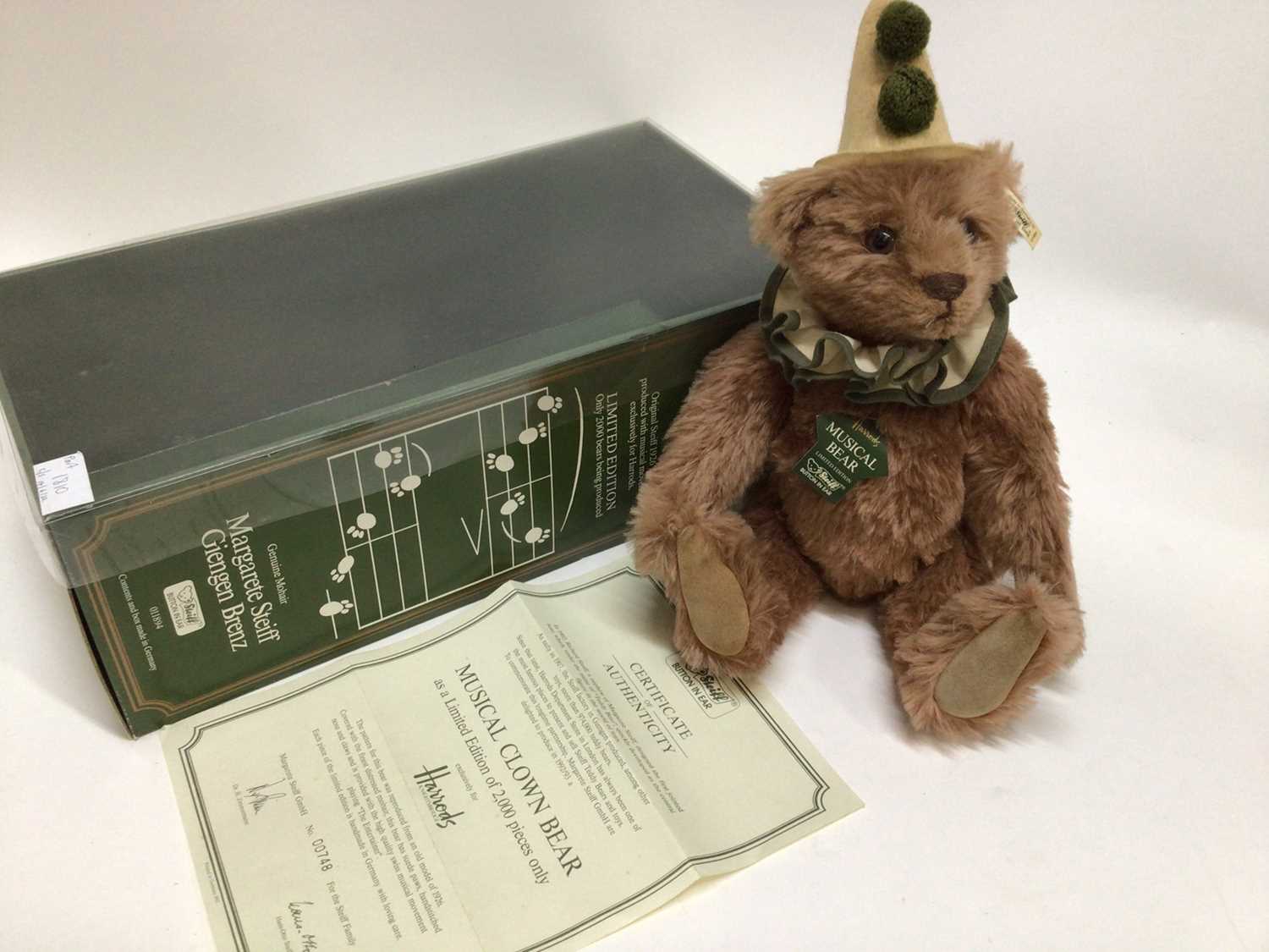 Lot 1810 - Steiff Bear 1993 Victorian Musical Bear 650680 and 1992 Harrods Musical Clown Bear 011894. Both boxed with certificates.