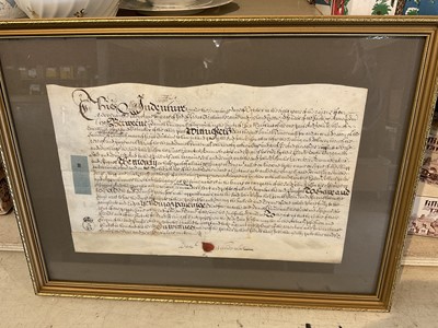 Lot 1462 - 17th century glazed indenture framed together with another and a collection of unframed indentures