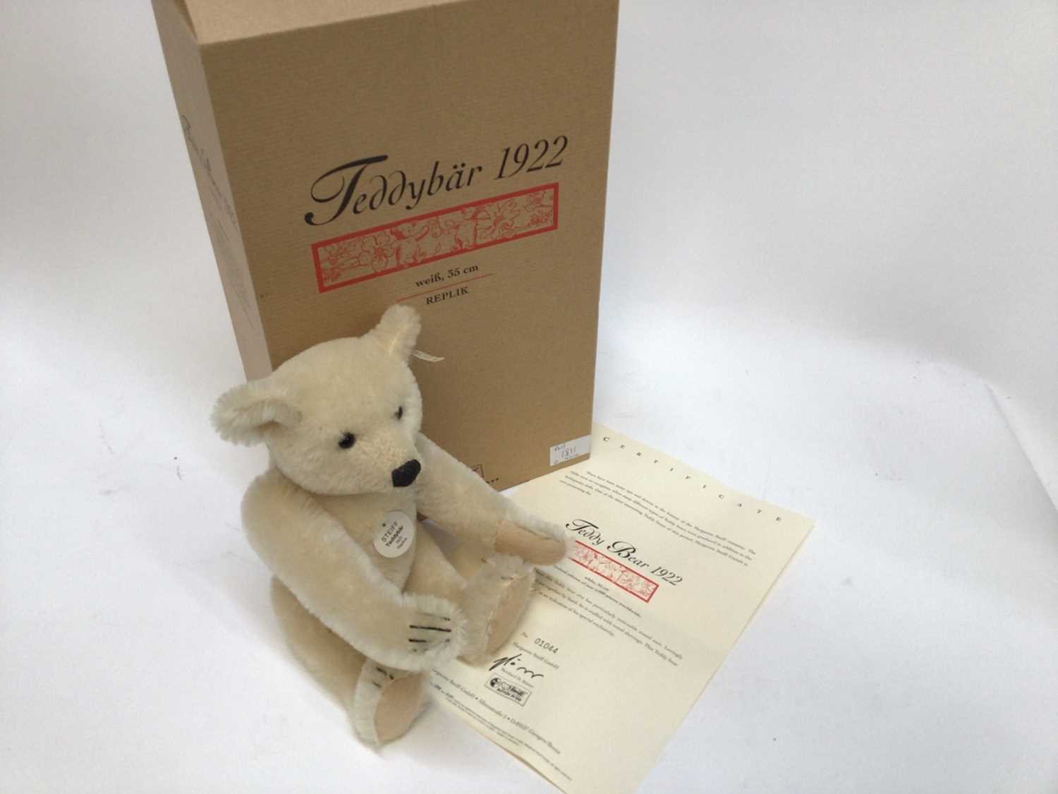 Lot 1811 - Steiff Bear 1996 Blond 43, 654411, 2000 Rose Tavern Bear 653261 and 2001 Teddy bear 1922 406898.  All boxed with certificates (3).