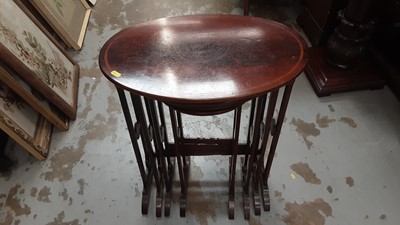 Lot 862 - Edwardian inlaid mahogany nest of four oval tables