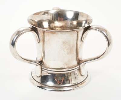 Lot 307 - Early 20th century silver three handled loving cup, 27ozs
