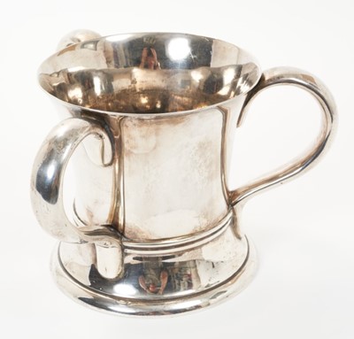 Lot 307 - Early 20th century silver three handled loving cup, 27ozs