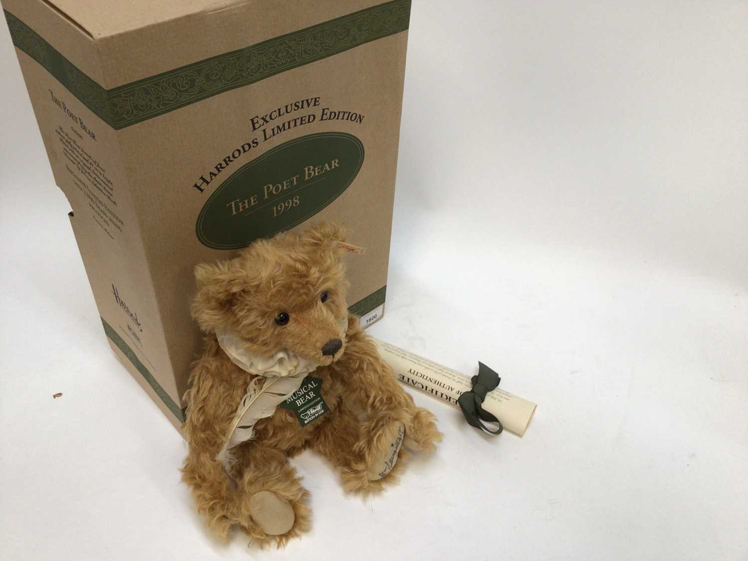 Lot 1820 - Steiff 1998 Poet bear 653186, Teddy Bears in Motorboat 037405, Jack in the Box 037818 and 2001 Musical Bear 670961.  All boxed with certificates.