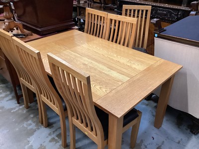 Lot 925 - Good quality contemporary light oak dining table on square legs,  together with a set of six matching chairs