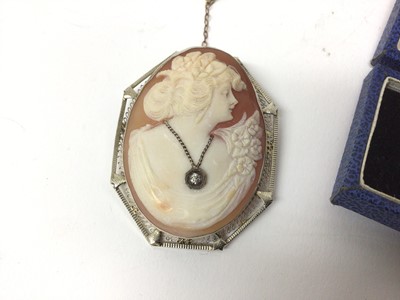 Lot 69 - Continental carved shell cameo, in 14k white gold filigree mount, the profile bust wearing a diamond-inset necklace, together with an Edwardian 9ct gold brooch with turquoise and diamonds