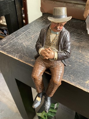 Lot 139 - Bernard Bloch pottery figure of a seated dozing man, 26cm high, together with partially complete bench