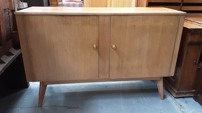 Lot 854 - Mid 20th century Morris of Glasgow Cumbrae sideboard with two doors enclosing single drawer and shelves, 138.5cm wide, 46cm deep, 89cm high