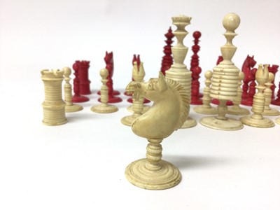 Lot 96 - Complete set of 19th century bone and red stained ivory chess pieces