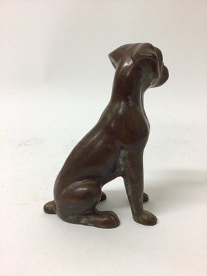 Lot 105 - Bronze sculpture of a seated dog, 17.5cm high