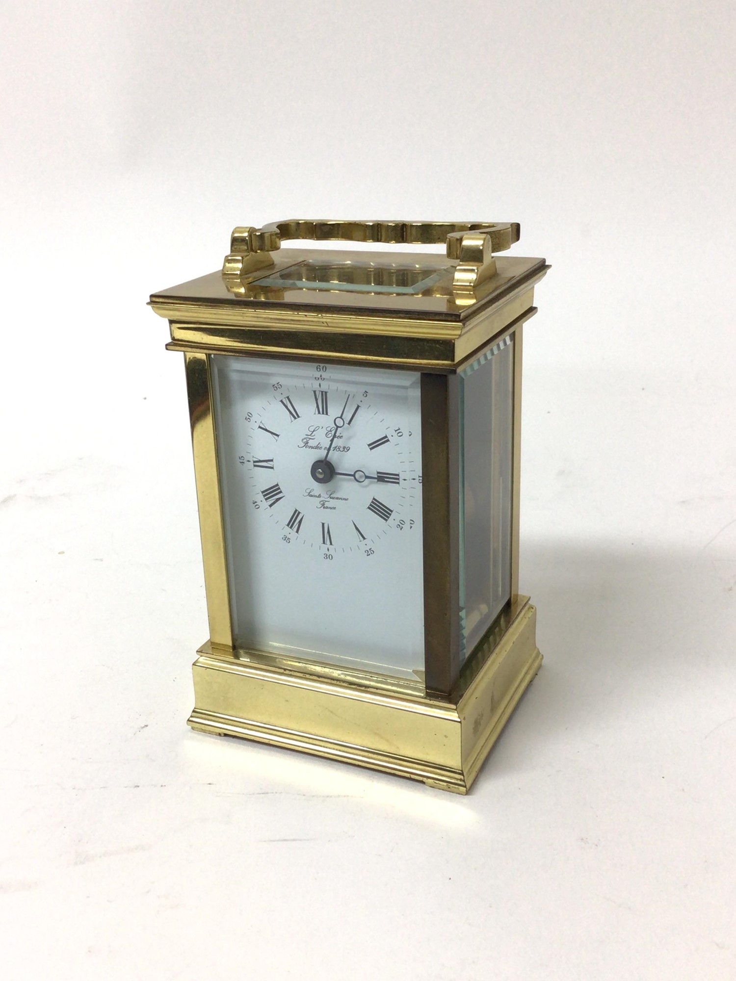 Lot 109 - Brass cased carriage clock, the dial marked