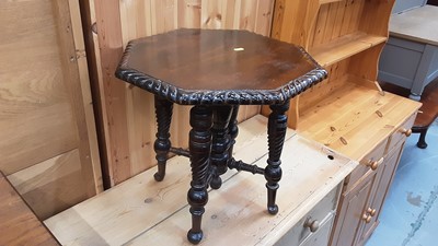 Lot 878 - Carved oak occasional table with octagonal top