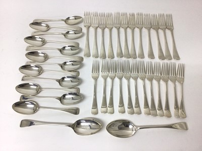 Lot 117 - Quantity of silver flatware, including twenty-four matching forks (twelve dessert and twelve dinner), twelve dessert spoons, and two table spoons (38 pieces)