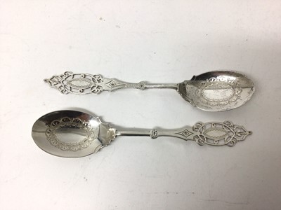 Lot 121 - Pair of Mappin &Webb pierced and engraved silver spoons, Sheffield 1919, 16cm longs