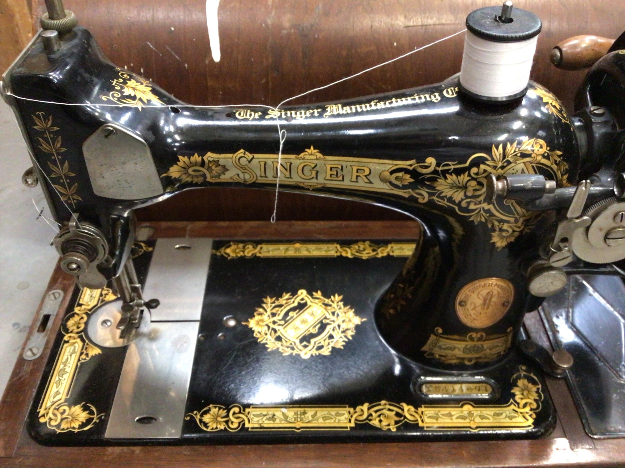 Lot 551 - Ornate gilded Singer sewing machine, Serial