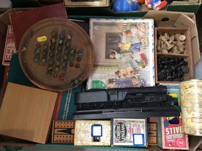 Lot 276 - Two boxes of vintage and later games and toys