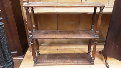 Lot 917 - Oak hanging three tier shelf together with a mahogany framed mirror (2)