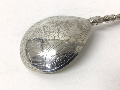 Lot 126 - Continental silver spoon, probably Norwegian, the bowl engraved with the Virgin and child, the back with Christ on the cross and a religious figure, the outside with inscription and the date 1577,...
