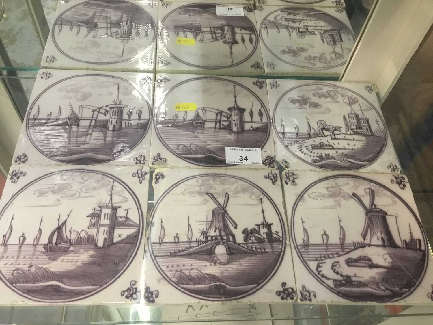 Lot 34 - Six 18th century Delft manganese tiles with painted windmill and landscape decoration