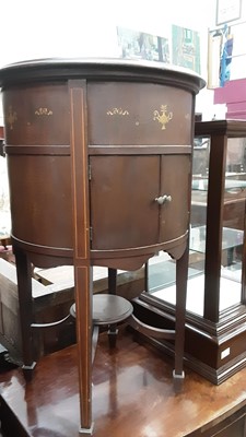 Lot 932 - Edwardian inlaid mahogany gramophone cabinet of circular form with rising hinged lid and two doors below on square taper legs with spade feet, 48.5cm diameter, 80.5cm high