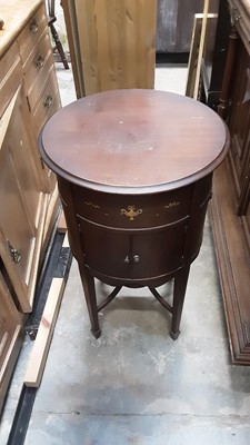 Lot 932 - Edwardian inlaid mahogany gramophone cabinet of circular form with rising hinged lid and two doors below on square taper legs with spade feet, 48.5cm diameter, 80.5cm high