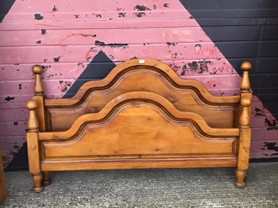 Lot 934 - Stained wooden framed King Size bed with head and foot boards with turned finials