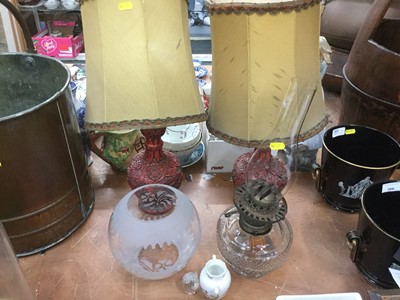 Lot 370 - Cut glass oil lamp reservoir together with shade and pair of faux cinnabar lacquer lamps
