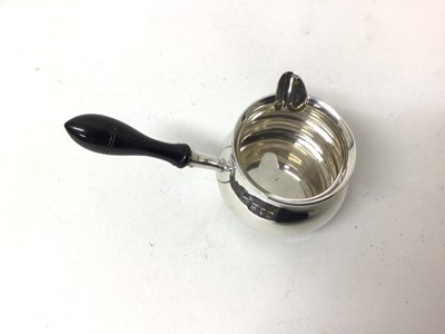 Lot 130 - Georgian silver chamberstick, Sheffield 1817, with associated silver plated snuffer, together with a silver cigar cutter and silver brandy warmer