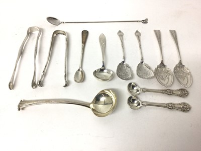 Lot 131 - Collection of silver, including a pair of Tiffany sugar tongs, a Georgian pair of tongs, a small Georgian silver ladle, a pair of heavy Victorian spoons, a spoon marked 'Birks Sterling', a pair of...