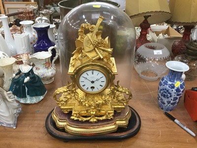 Lot 372 - 19th century French mantel clock in ornate gilded case, under glass dome