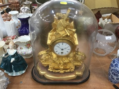 Lot 372 - 19th century French mantel clock in ornate gilded case, under glass dome