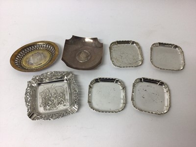 Lot 132 - Collection of silver dishes, including a Dutch relief-moulded ashtray, stamped '90', a set of four 1930s square dishes, an 1899 Queen Victoria crown dish, and a silver gilt pierced dish (7)