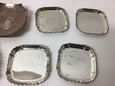 Lot 132 - Collection of silver dishes, including a Dutch relief-moulded ashtray, stamped '90', a set of four 1930s square dishes, an 1899 Queen Victoria crown dish, and a silver gilt pierced dish (7)