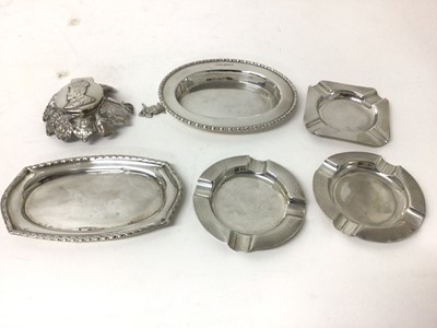 Lot 186 - Two silver bon bon dishes, three silver ashtrays, and a silver inkwell mount