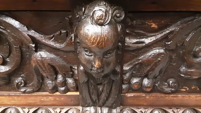 Lot 948 - Late Victorian carved oak sideboard with two frieze drawers and cupboards below with carved lions head handles, 132cm wide, 54.5cm deep, 105cm high