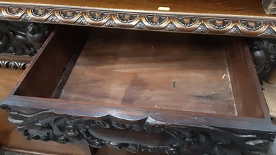 Lot 948 - Late Victorian carved oak sideboard with two frieze drawers and cupboards below with carved lions head handles, 132cm wide, 54.5cm deep, 105cm high