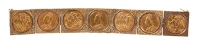 Lot 611 - Gold bracelet with seven gold full sovereigns in gold setting.