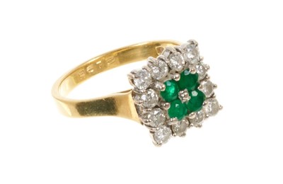 Lot 581 - Emerald and diamond cluster ring with a square cluster of four emeralds surrounded by twelve brilliant cut diamonds in claw setting on 18ct yellow gold shank