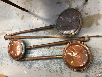 Lot 590 - Three copper warming pans and posting horn