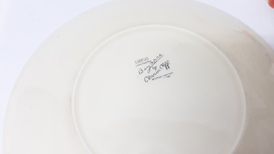 Lot 1134 - Three Clarice Cliff plates, together with a Celtic Harvest preserve pot (4)