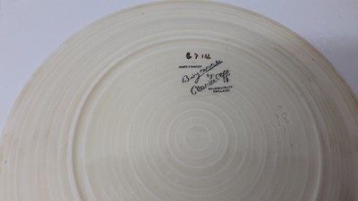 Lot 1134 - Three Clarice Cliff plates, together with a Celtic Harvest preserve pot (4)