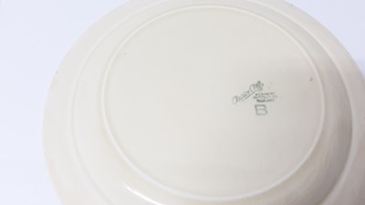 Lot 1134 - Three Clarice Cliff plates, together with a Celtic Harvest preserve pot (4)