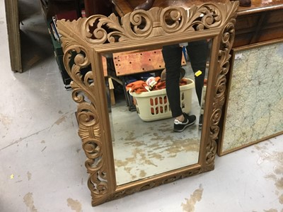 Lot 397 - Bevelled wall mirror in carved gilt frame