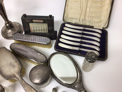 Lot 201 - Quantity of silver, including knives, brushes, toiletry jars, desk calendar, etc
