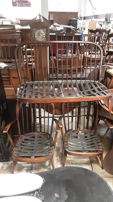 Lot 987 - Ercol stick back three piece suite comprising two seater settee and pair of armchairs