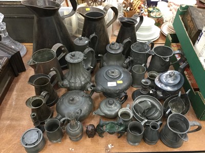 Lot 428 - Collection of pewter and other metalwares to include measuring jugs, teapots, tankards and others.