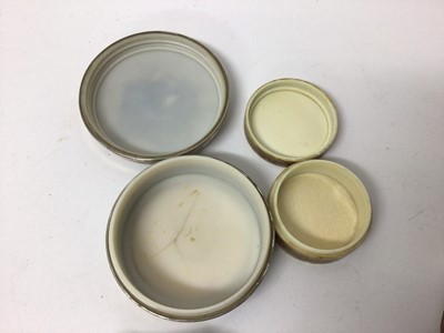 Lot 223 - Collection of trinket boxes, including one silver with a Christies label to base, one painted ivory, another silver with inset stone cover, and three continental porcelain with brass mounts (6)