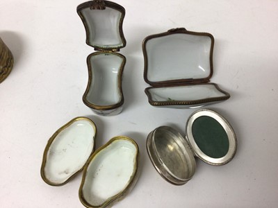 Lot 223 - Collection of trinket boxes, including one silver with a Christies label to base, one painted ivory, another silver with inset stone cover, and three continental porcelain with brass mounts (6)