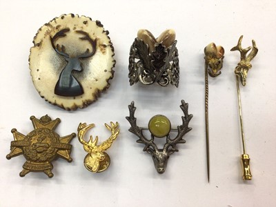 Lot 683 - Yellow metal stag head tie pin, silver stag head brooch, stag teeth jewellery